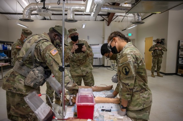 Lt. Gen. Theodore Martin, Commander U.S. Army Combined Arms Center, or CAC, visited the U.S. Army Medical Center of Excellence (MEDCoE), Joint Base San Antonio-Fort Sam Houston, Texas, September 8-10. Pictured center receiving overview brief on blood draw operations performed by 68W Combat Medic’s assigned to MEDCoE during a culminating Field Training Exercise at the Soldier Medic Training Site, Medical Education and Training Campus, Joint Base San Antonio-Camp Bullis, September 10. 
