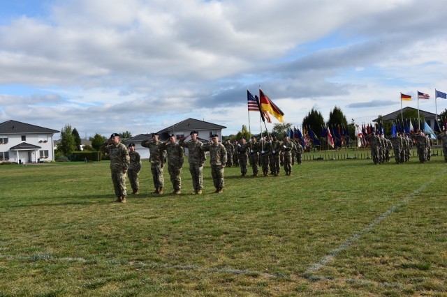 The 2nd Multi-Domain Task Force waits at attention for their colors to be uncased and the unit to be officially activated.