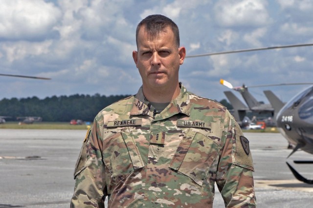 Chief Warrant Officer 4 Bradley J. Renneke, chief of standards and senior warrant adviser at Cairns Army Airfield for the 1st Battalion, 223d Aviation Regiment, U.S. Army Aviation Center of Excellence, stands on the Cairns flight line at Fort Rucker, Alabama, Sept. 11, 2021.