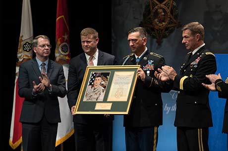 Staff Sgt. David G. Bellavia is inducted into the Pentagon Hall of Heroes at the Pentagon, Arlington, Va., June 26, 2019, for actions while serving as a squad leader with the 1st Infantry Division in support of Operation Phantom Fury in Fallujah, Iraq. (U.S. Army Photo by Sgt. Kevin Roy)