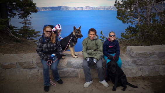 Staff Sgt. Ty Carter’s wife Shannon, his daughter Sehara, his son Jayden, and his daughter Madison, along with family dogs Nala and Karma, pause for a photo along the rim of Crater Lake, Ore., during a family vacation, June 2013.
