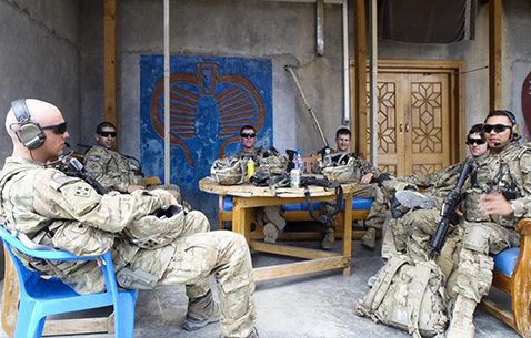 From left, then-Sgt. Addison Clark, 1st Lt. Florent Groberg, Pfc. Benjamin Secor, Sgt. 1st Class Brian Brink, Sgt. Andrew Mahoney and Spc. Daniel Balderrama of the brigade command group's personal security detail, 4th Infantry Brigade Combat Team, 4th Infantry Division, take some downtime during a deployment to Kunar Province, Afghanistan, 2012. (Courtesy photo)