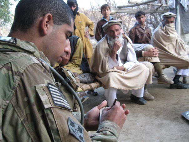 Then-U.S. Army 2nd Lt. Florent Groberg conducts a key leader engagement meeting in Kunar Province, Afghanistan, February 2010. (Courtesy of Retired Capt. Florent Groberg)
