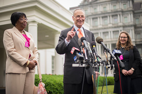 New York Sen. Chuck Schumer thanks those who helped champion the effort for World War I hero and Albany resident, Sgt. Henry Johnson to receive the Medal of Honor at the White House, June 2, 2015. Then-Pvt. Johnson, an African-American, distinguished himself as a member of 369th Infantry Regiment "Harlem Hellfighters," 93rd Division, American Expeditionary Forces, during combat operations against the enemy on the front lines of the Western Front in France during World War I. While on night sentry duty, May 15, 1918, Johnson and a fellow Soldier, Pvt. Needham Roberts, received a surprise attack by a German raiding party consisting of at least 12 soldiers. While under intense enemy fire and despite receiving significant wounds, Johnson mounted a brave retaliation resulting in several enemy casualties. When his fellow Soldier was badly wounded, Johnson prevented him from being taken prisoner by German forces. Wielding only a knife and being seriously wounded, Johnson continued fighting, took his Bolo knife and stabbed it through an enemy soldier's head. Displaying great courage, Johnson held back the enemy force until they retreated. The "Harlem Hellfighters" were the first all-black regiment that helped change the American public's opinion on African-American Soldiers that helped pave the way for future African-American Soldiers. U.S. Army photo by Staff Sgt. Bernardo Fuller