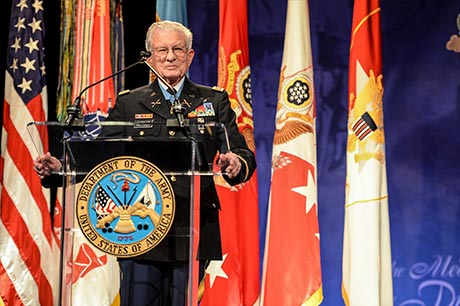 Retired Lt. Col. Charles Kettles speaks to the audience during his induction ceremony to the Hall of Heroes at the Pentagon, in Arlington, Va., July 19, 2016, for actions during a battle near Duc Pho, South Vietnam, May 15, 1967.
