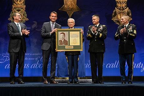 Secretary of Defense Ashton Carter, Secretary of the Army Eric Fanning, Vice Chief of Staff Gen. Daniel Allyn and Sgt. Maj. of the Army Daniel Dailey present a framed Medal of Honor citation to retired Lt. Col. Charles Kettles during the Hall of Heroes Induction Ceremony at the Pentagon, in Arlington, Va., July 19, 2016, for actions during a battle near Duc Pho, South Vietnam, on May 15, 1967. Photo by Sgt. Alicia Brand