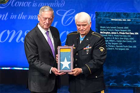 Secretary of Defense James Mattis presents the Medal of Honor flag to former Spc. 5 James C. McCloughan during the Medal of Honor Induction Ceremony at the Pentagon, in Arlington, Va., Aug. 1, 2017. McCloughan was awarded the Medal of Honor for distinguished actions as a combat medic assigned to Company C, 3rd Battalion, 21st Infantry Regiment, 196th Infantry Brigade, Americal Division, during the Vietnam War near Don Que, Vietnam, from May 13 to 15, 1969. U.S. Army photo by Sgt. Alicia Brand