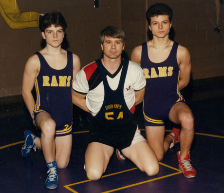 Coach James McCloughan (center) poses with his two sons, Matthew (left) and Jamie (right) at South Haven High School in 1988. (Photo courtesy of former U.S. Army Spc. 5 James McCloughan)