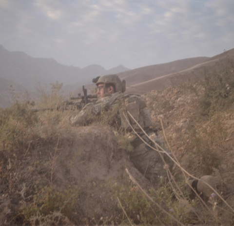 Sgt. Maj. Payne in Northern Afghanistan in 2014. Payne and his unit had been ambushed on this same hill the day prior. (Photo courtesy of Sgt. Maj. Thomas P. Payne)