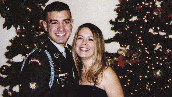 Sergeant First Class Petry and his wife Ashley at a holiday event