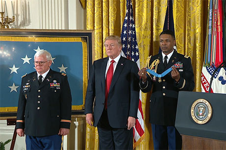 President Donald Trump places the Medal of Honor around the neck of Capt. Mike Rose, during an Oct. 23, 2017 ceremony at the White House, in Washington, D.C. U.S. Army photo by C. Todd Lopez