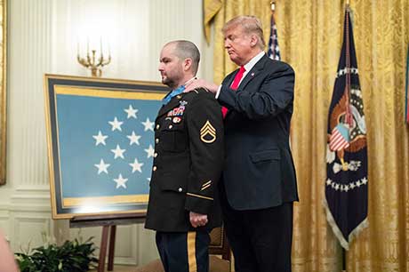 The Medal of Honor is presented to former U.S. Army Staff Sgt. Ronald J. Shurer II during a ceremony at the White House in Washington, D.C., Oct. 1, 2018. Shurer was awarded the Medal of Honor for actions while serving as a senior medical sergeant with the Special Forces Operational Detachment Alpha 3336, Special Operations Task-Force-33, in support of Operation Enduring Freedom in Afghanistan, April 6, 2008. (White House Photo by Shealah Craighead)