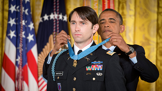 President Barack Obama presents the Medal of Honor to former Army Capt. William D. Swenson, citing his extraordinary heroism in the Battle of Ganjgal, in Kunar Province, Afghanistan.
