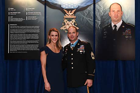 Master Sgt. Matthew O. Williams and his wife after the Hall of Heros Induction Ceremony at the Pentagon, Arlington, Va., Oct. 31, 2019.