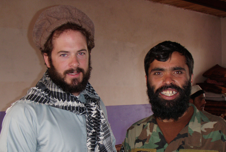 Then-Sgt. Matthew Williams assigned to 3rd Special Forces Group (Airborne), stands with an Afghanistan commando sergeant major, after conducting a local meeting with the key leader of a village outside of Camp Morehead, Afghanistan in 2011. (Photo Courtesy of U.S. Army Master Sgt. Matthew Williams)