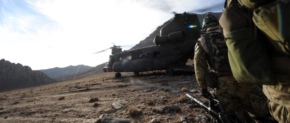 Rangers running toward a helicopter